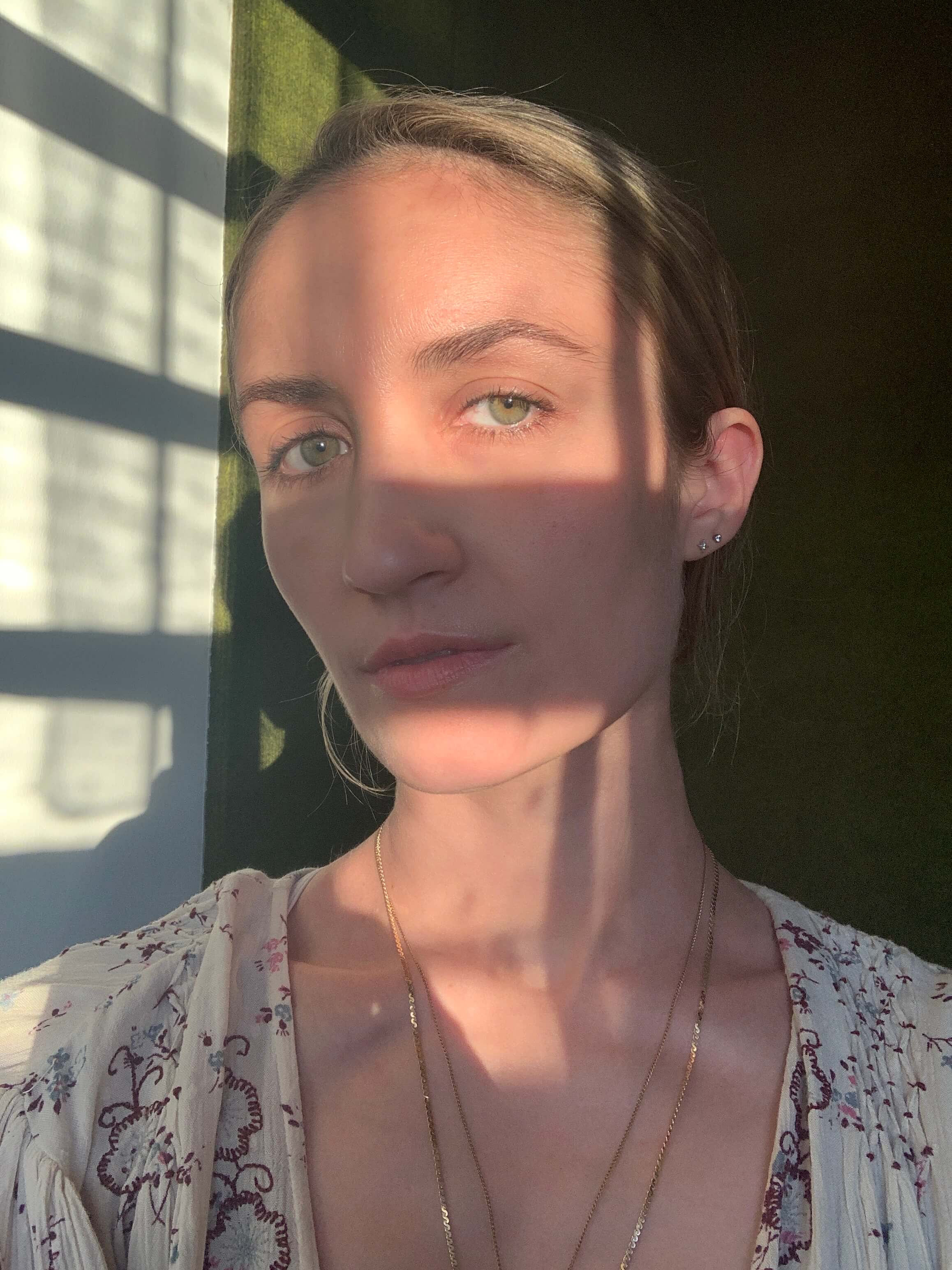 Photo of Sarah in golden-hour light